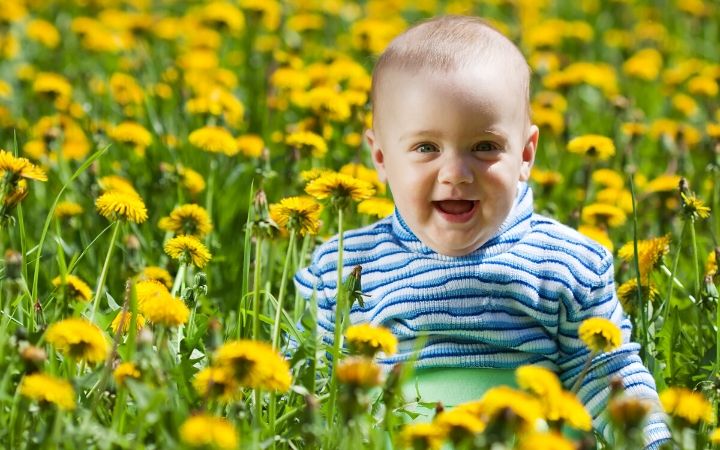 Baby boy and flowers - The Proud Italian