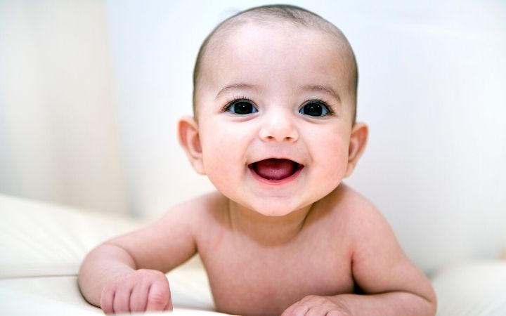 Baby smiling - The Proud Italian