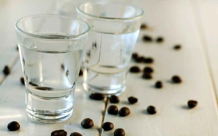 Anisette with coffee beans, The History, Benefits, and Joy of Anisette - The Proud Italian