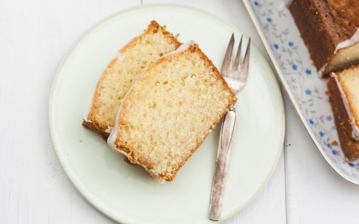Making Italian Lemon Pound Cake served on a plate with a fork - The Proud Italian