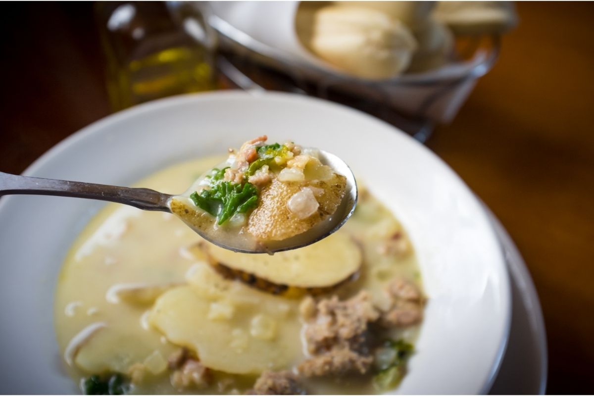 A spoon of Zuppa Toscana