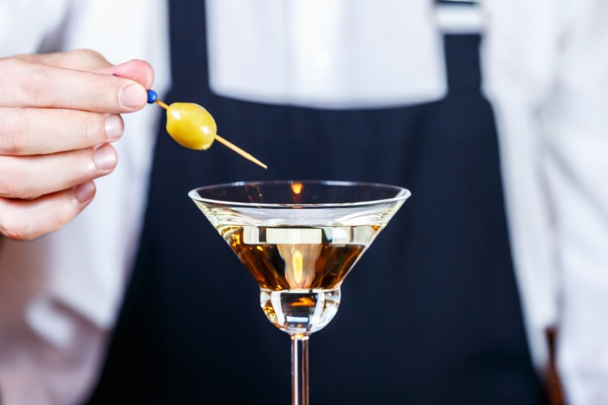Barman Decorating Martini Cocktail