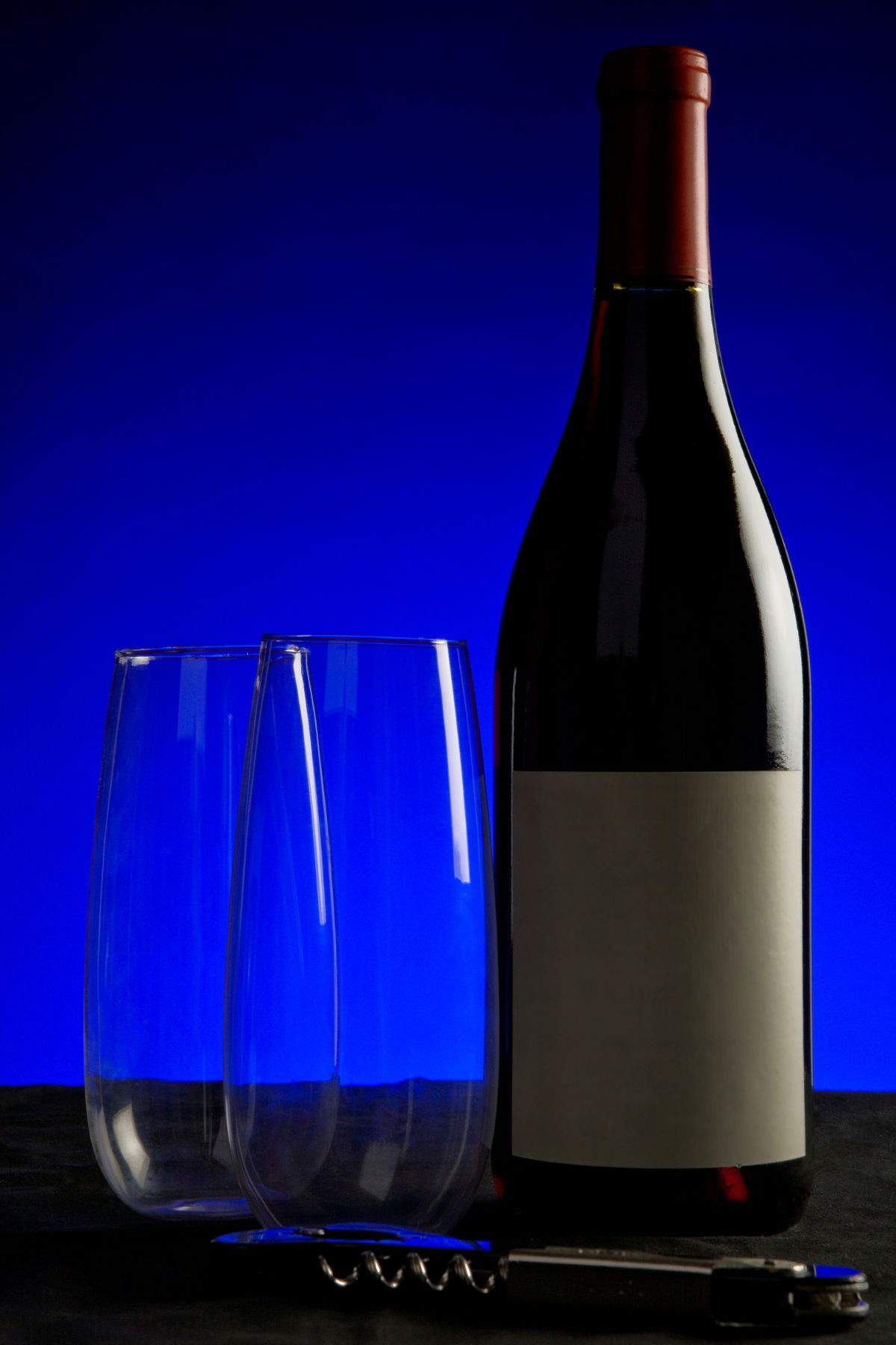 Red wine and stemless wine glasses