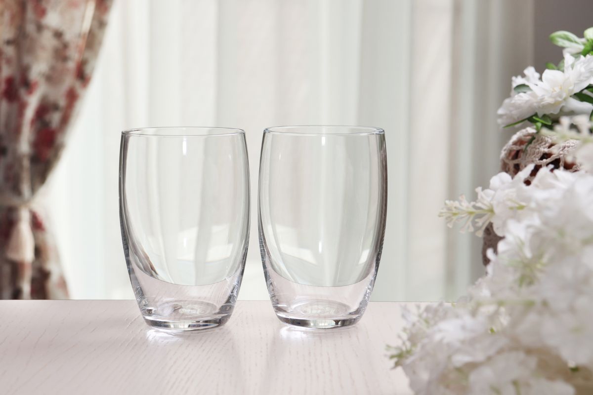 two stemless wine glasses