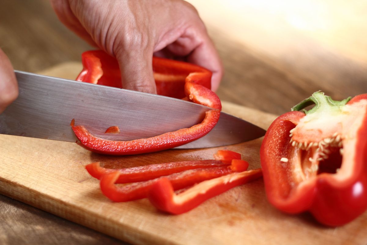 Cutting red bell pepper