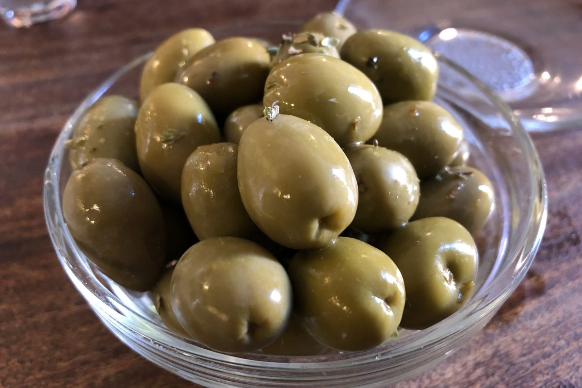 Green olives in a plate